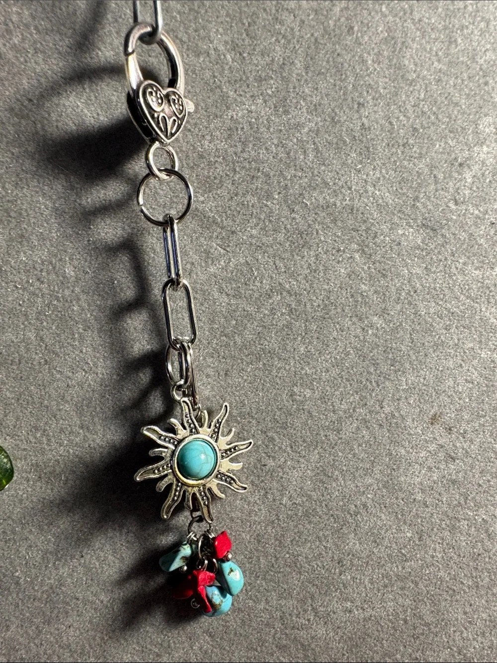 Hand Crafted Silver Sunburst Keychain with Turquoise and Red Accents